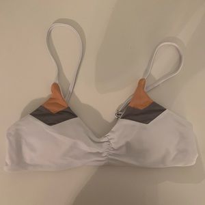 White bikini top w orange and grey arrows